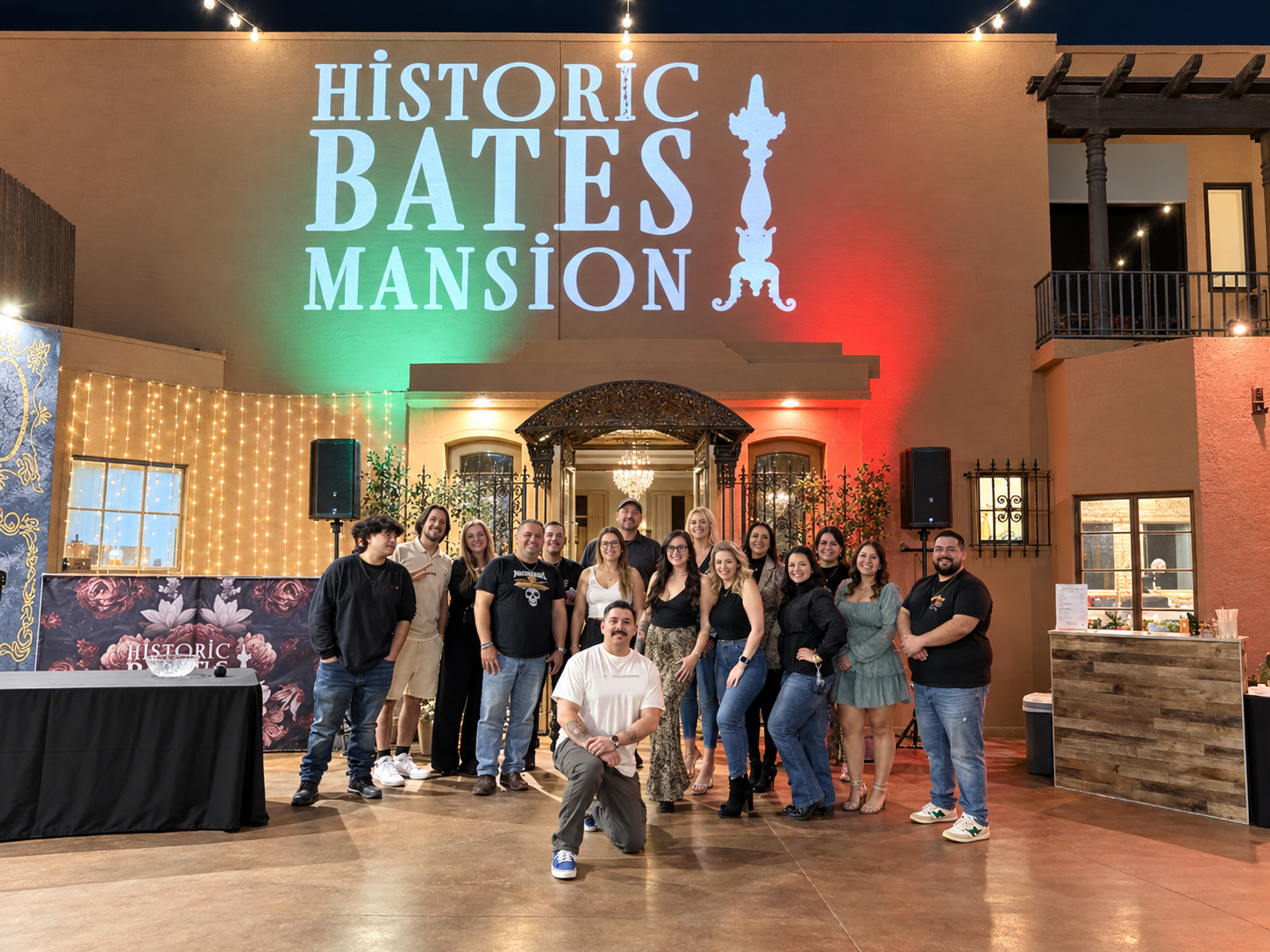 The Historic Bates Mansion team gathered outside the venue